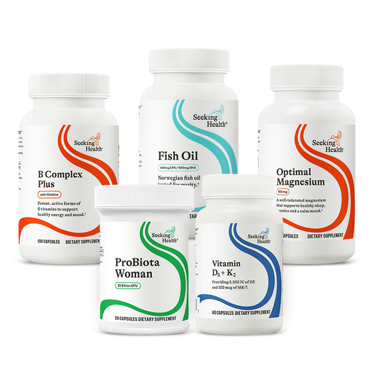 Collection of Seeking Health dietary supplement bottles on a white background