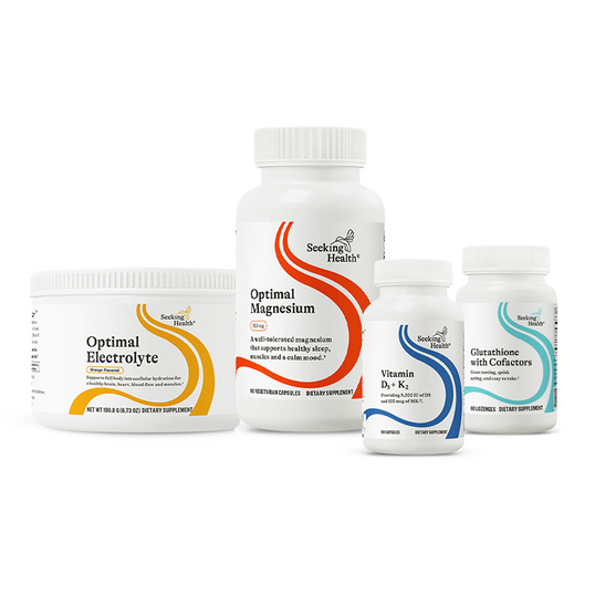 Four supplement bottles from Seeking Health on a white background