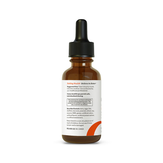 An amber glass dropper bottle with a black cap and a white label, shown on a plain white background. The label contains black and orange text and a small orange graphic.
