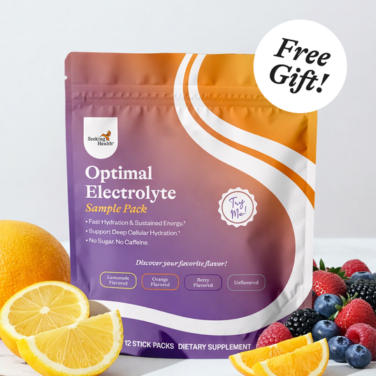 Optimal Electrolyte sample pack with fruits on a white background