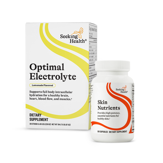 Supplement packaging for 'Optimal Electrolyte' and 'Skin Nutrients' by Seeking Health on a white background.