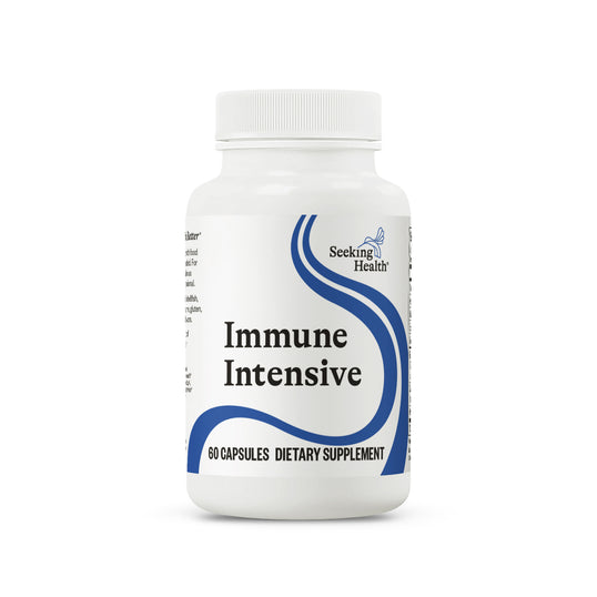 A white plastic bottle of Seeking Health Immune Intensive dietary supplement with a white cap, featuring a white label with blue graphic accents and black text.