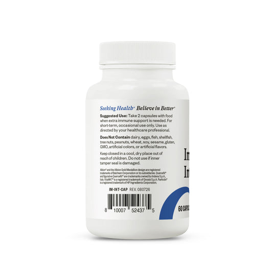 A white plastic supplement bottle shown from the back on a clean white background, displaying the product's back label with text and a barcode.