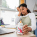 Image of woman tired at desk 