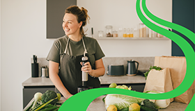 Image of woman mixing a smoothie